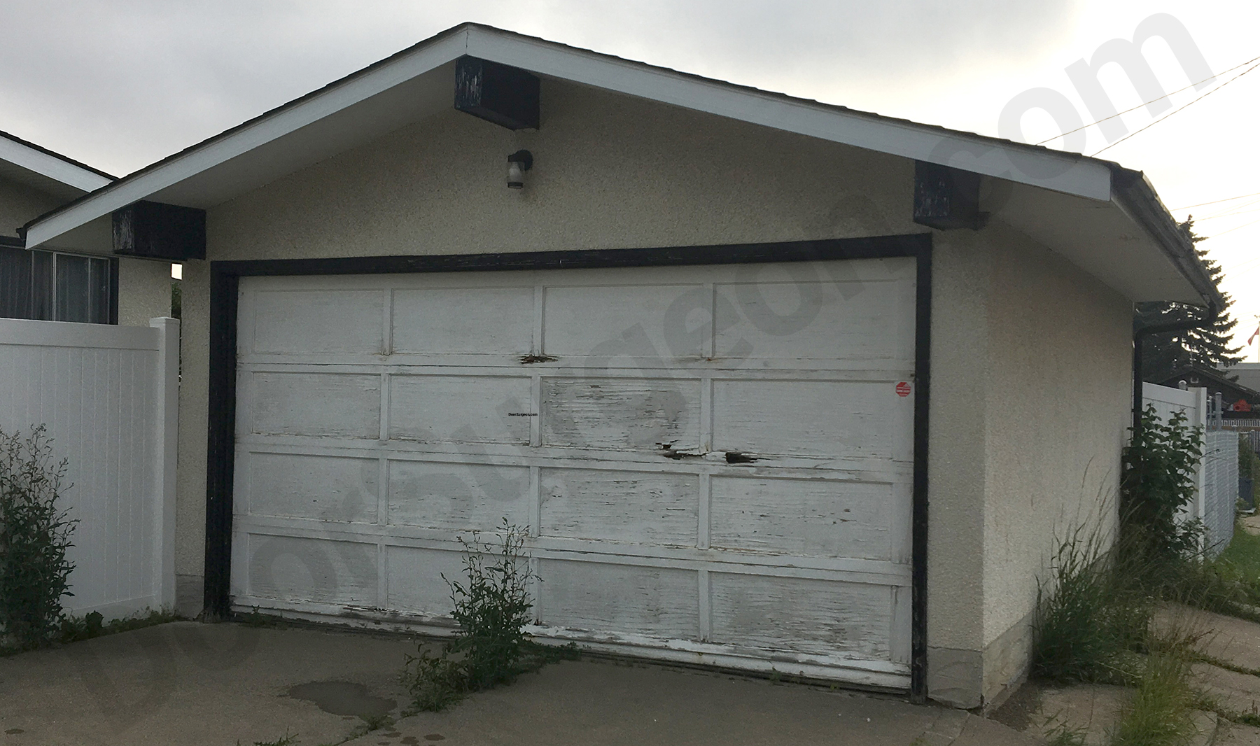 South Edmonton garage door removal & disposal of old garage door panels track rollers hinges springs