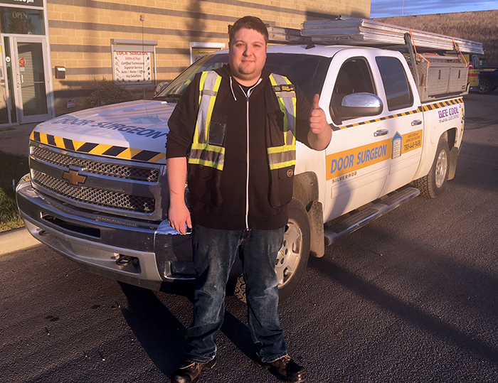 Door Surgeon technician JJ and service truck.