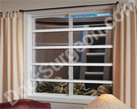 Acheson window bars and security bars in standard sizes or custom built window bars.