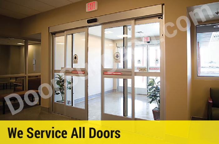 Sliding doors opened by motion sensor allowing people to exit the building.