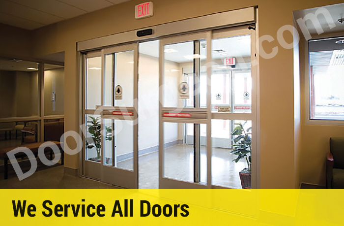 Sliding doors opened by motion sensor allowing people to exit the building Calgary.