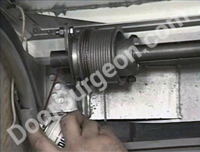 rolling door shaft drum spring repair replacement