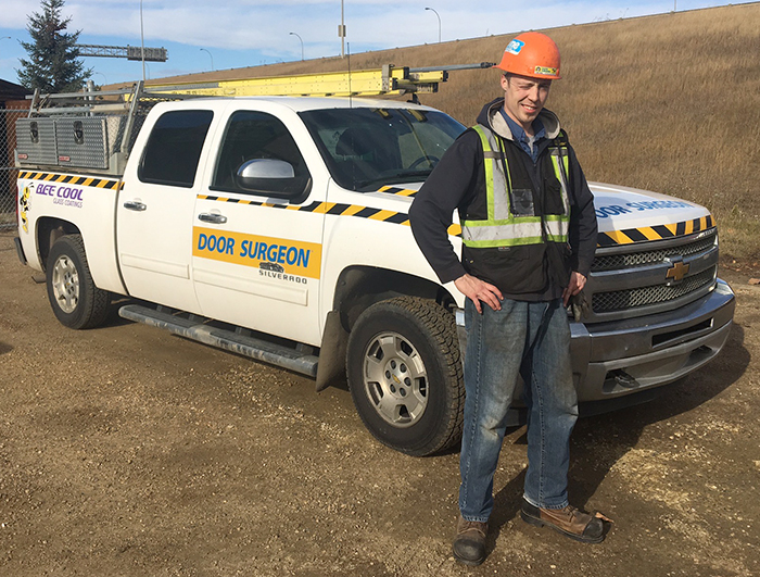 Service Truck and technician from Door Surgeon Morinville