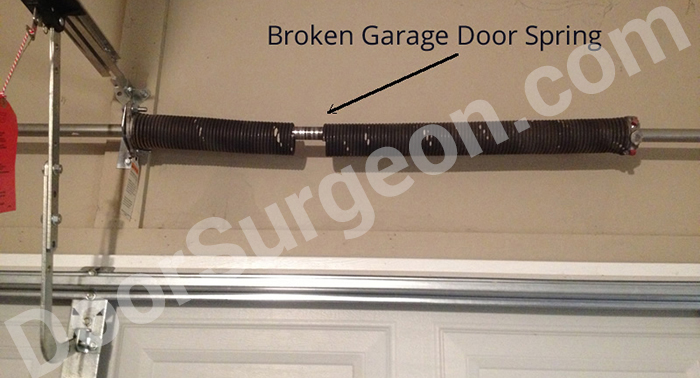 Door Surgeon broken residential garage door spring.